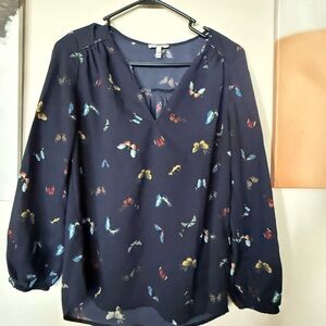 USED- Joie Navy Blouse with Colorful Butterfly Print. In great condition.
